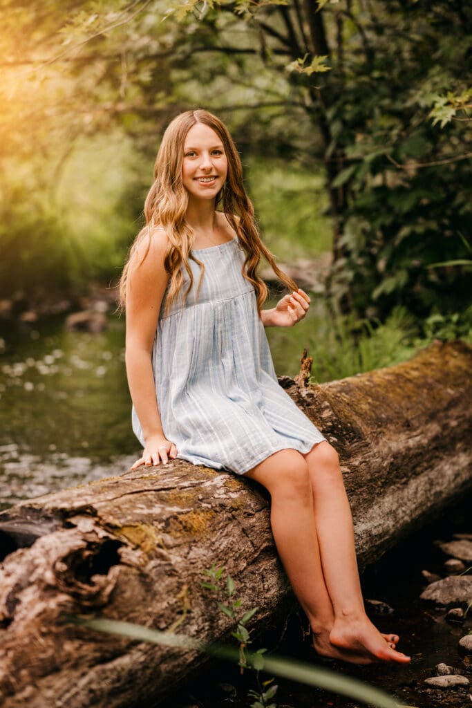 Senior photographed using higher ISO settings at sunset