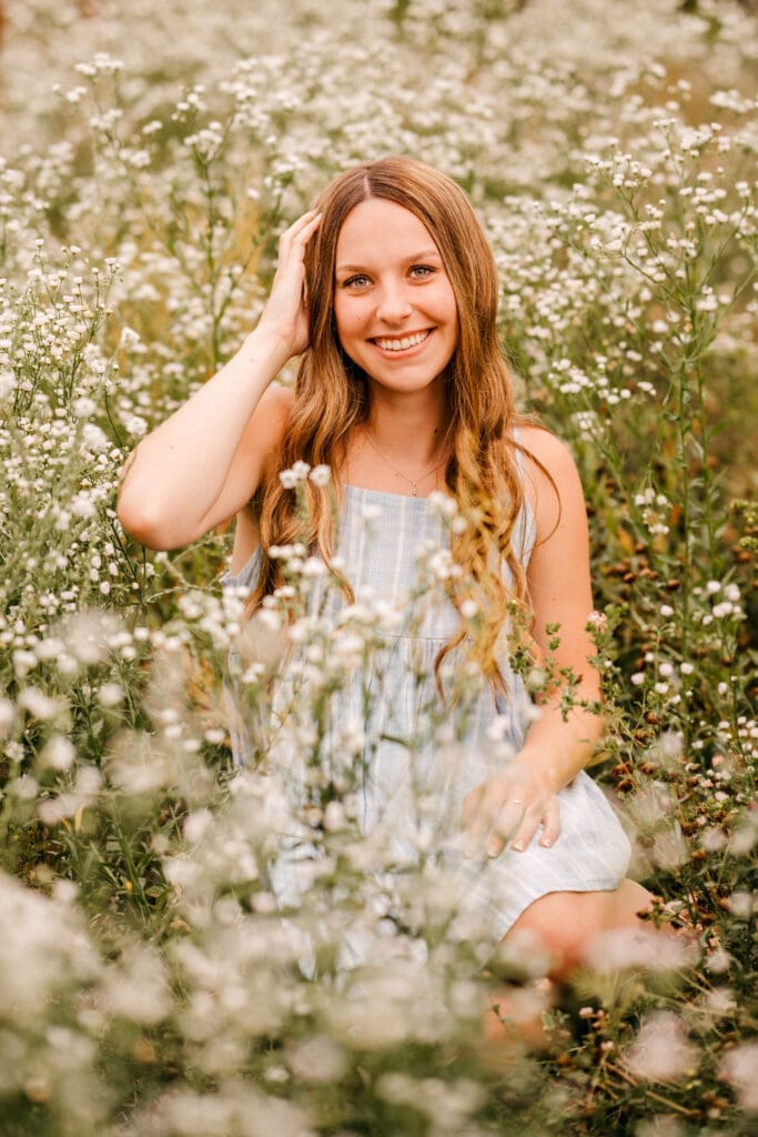 Senior photographed using higher ISO settings at sunset