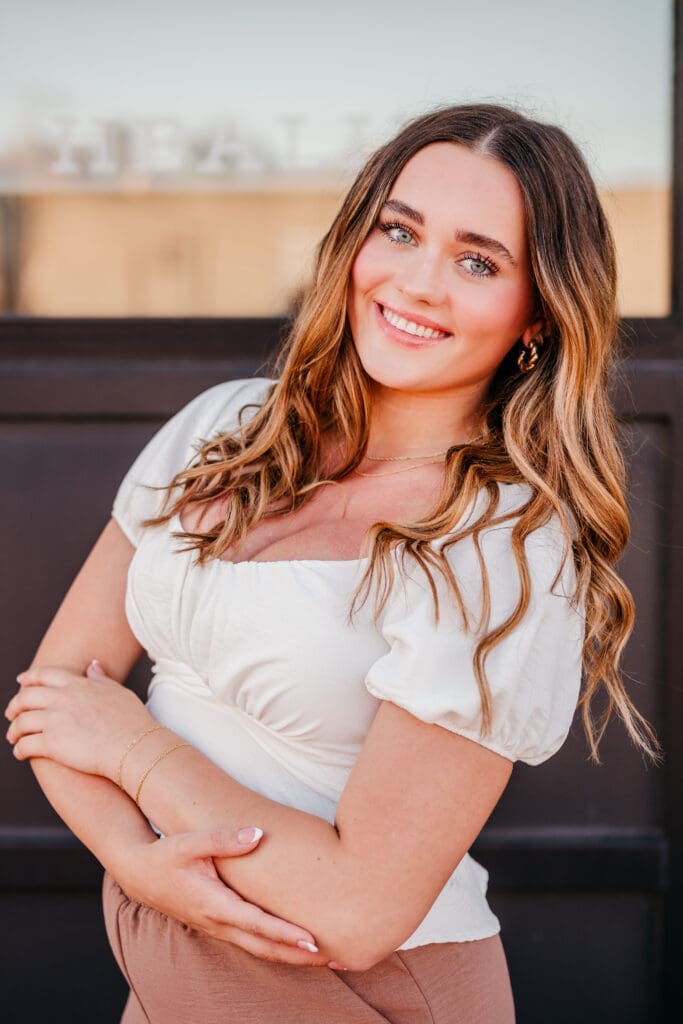 Senior portrait photographed using higher ISO settings at sunset