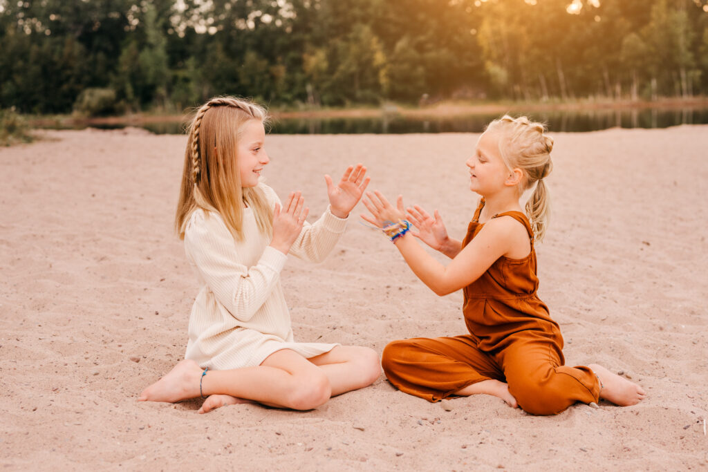 Happy family smiling together during an outdoor family photography session