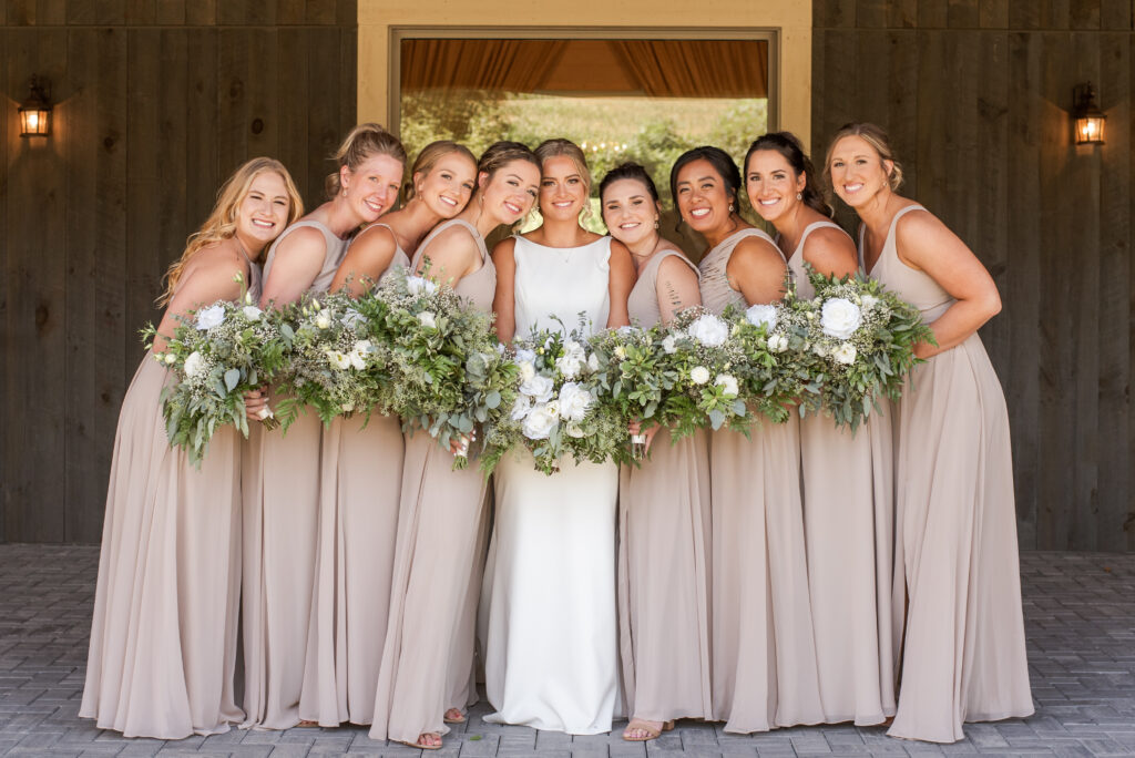 Wedding party group photo with rows close together for sharp focus