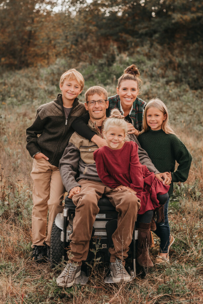 Extended family posing together during an outdoor portrait session