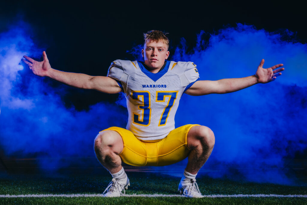How to get the background dark in sports photography using off-camera lighting